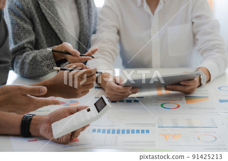 Group of IT consultant working by digital tablet and management big data and analyze financial document of company. 91425213