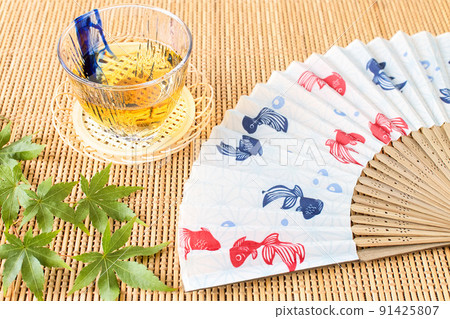 Folding fan, barley tea and maple | Cool summer image Folding fan, barley tea and maple | Cool summer image 91425807