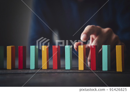 Domino and men's hands 91426825