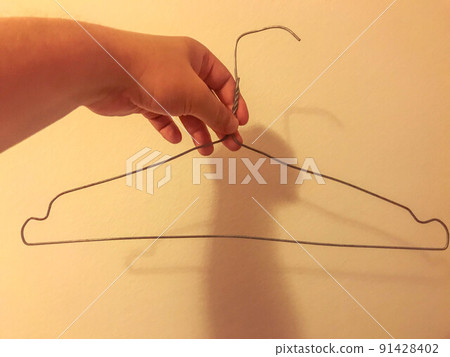 homemade wire hanger for clothes. clumsy, uneven hanger with your own hands. storing clothes in a poor man's wardrobe 91428402