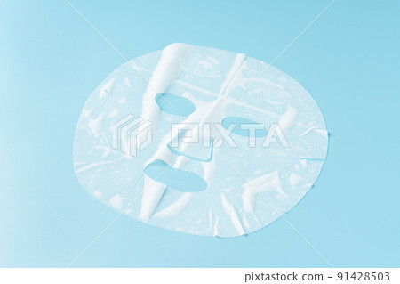 Face pack on blue background 91428503