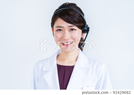 A lady in white 91429082