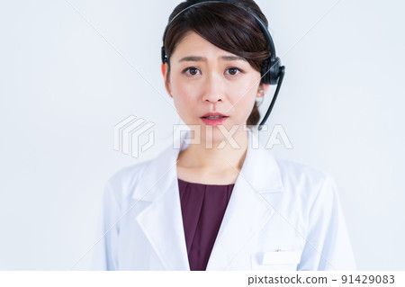 A lady in white 91429083