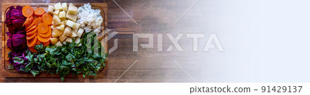 Board with ingredients for preparing tasty borscht on white background Board with ingredients for preparing tasty borscht on white background 91429137