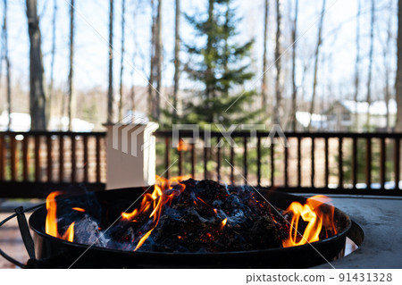 Barbecue grill with fire on open air close up Barbecue grill with fire on open air close up 91431328