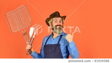 summer weekend. happy hipster hold cooking utensils summer weekend. happy hipster hold cooking utensils 91434366