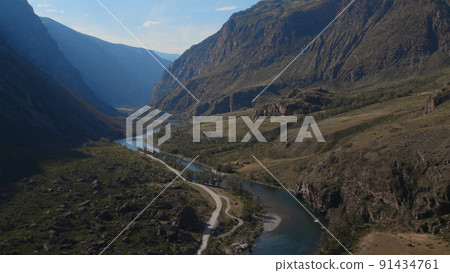 Valley Chulyshman with river and and mountains with blue clear sky in Altai Valley Chulyshman with river and and mountains with blue clear sky in Altai 91434761