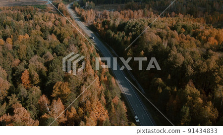 Asphalt road with traffic cars between forest in Ural Asphalt road with traffic cars between forest in Ural 91434833