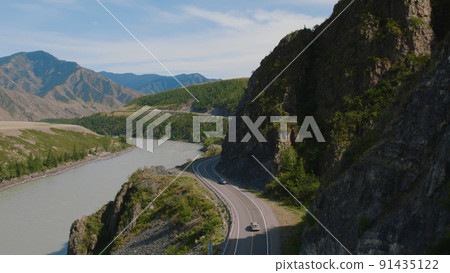 Mountains valley of Altai with traffic cars on Chuya highway and Katun river Mountains valley of Altai with traffic cars on Chuya highway and Katun river 91435122