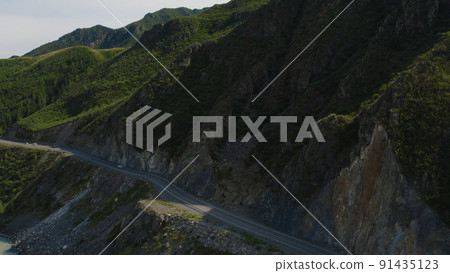 Mountains valley of Altai with traffic cars on Chuya highway Mountains valley of Altai with traffic cars on Chuya highway 91435123