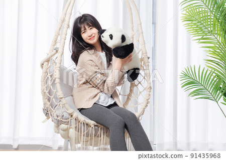 Asian girl living at home Asian girl living at home 91435968