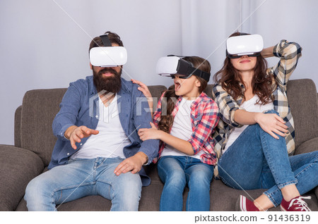 digital future and innovation. modern life. father mother and child wireless VR glasses. 91436319