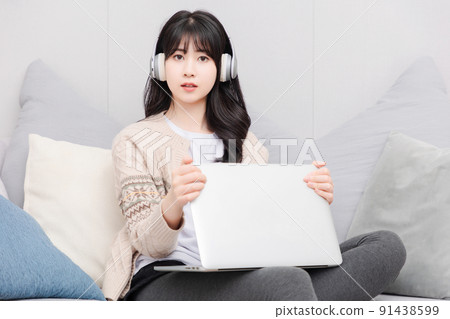 Asian girl living at home 91438599
