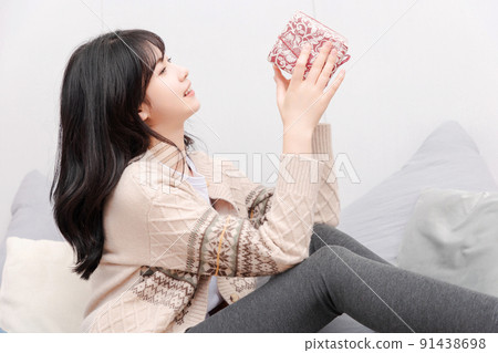 Asian girl living at home Asian girl living at home 91438698