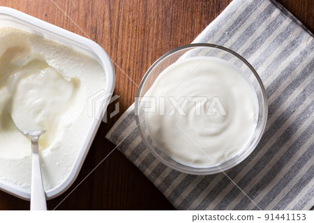 Yogurt on the table 91441153