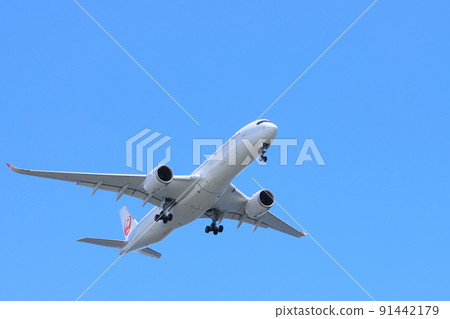 Passenger plane taking off; passenger plane rising 91442179
