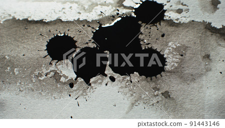 Black ink splatter. Grunge background. Fluid blob. Dark paint spill drops blots on white weathered vintage paper surface abstract texture. Black ink splatter. Grunge background. Fluid blob. Dark paint spill drops blots on white weathered vintage paper surface abstract texture. 91443146