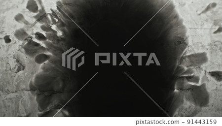 Black water ink splash. Dirt stain texture. Old film overlay. Dark wet paint drop blot on gray distressed aged vintage abstract background. 91443159