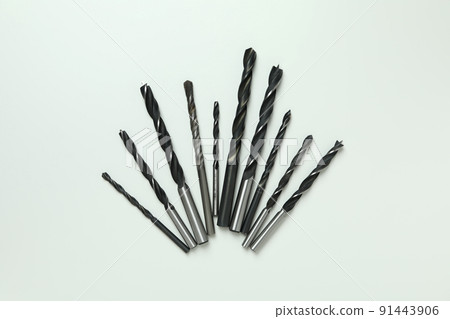 Set of drills on white background, close up Set of drills on white background, close up 91443906