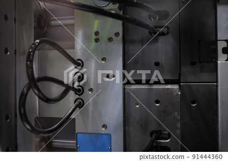Mold plates - part of automatic injection molding machine at exhibition Mold plates - part of automatic injection molding machine at exhibition 91444360