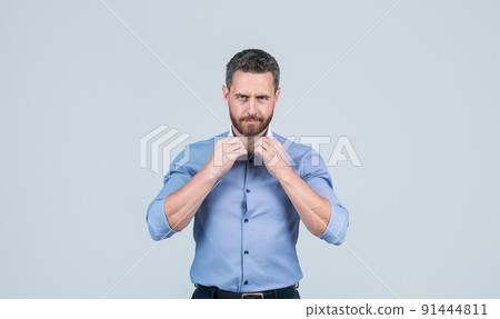 handsome unshaven businessman in shirt. confident bearded guy grooming. 91444811