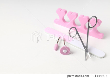 Concept of nail care with manicure accessories on white background Concept of nail care with manicure accessories on white background 91444905
