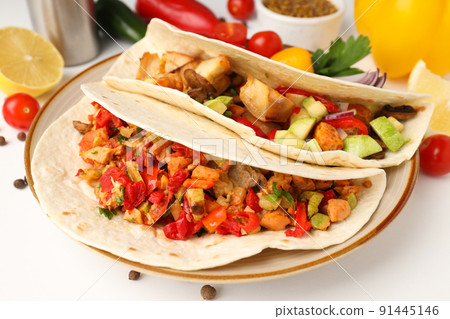 Concept of tasty food with taco close up Concept of tasty food with taco close up 91445146