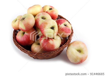 Flat peach (doughnut peach, donut peach, UFO peach, peento peach, saucer peach). Ancient Chinese variety "Pan tao". Delicacy 91446685