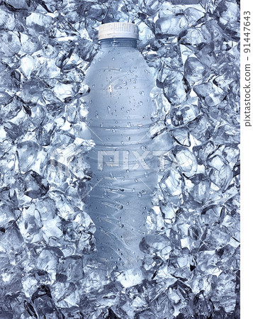 close up of a water bottle in ice close up of a water bottle in ice 91447643