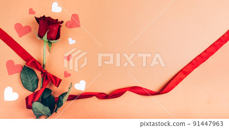 Red rose with message card. 91447963