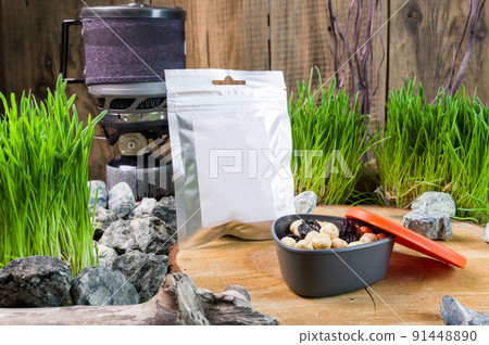 Tourist food and nuts in a plastic box. Dry food in a bag. Food and snacks for tourists. 91448890