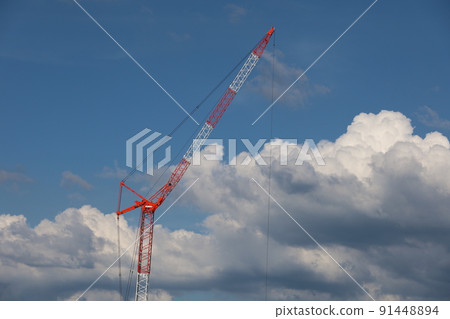 Crane on white clouds Crane on white clouds 91448894