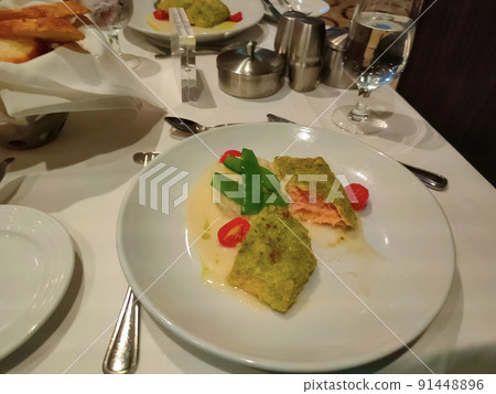 The fish at dinner at the abstract cruise ship restaurant The fish at dinner at the abstract cruise ship restaurant 91448896