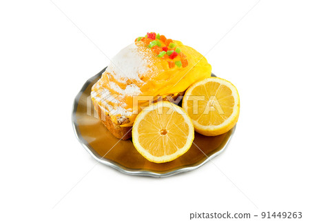 Lemon cupcake and lemon isolated on white . 91449263