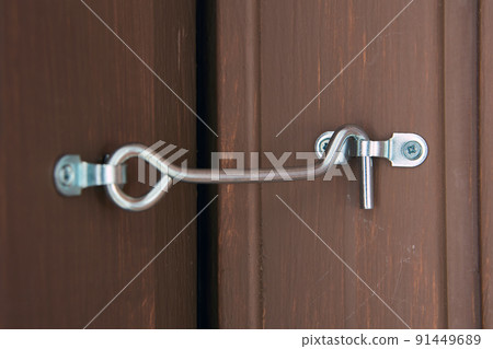 Rustic hook and eye door lock for doors locking. 91449689