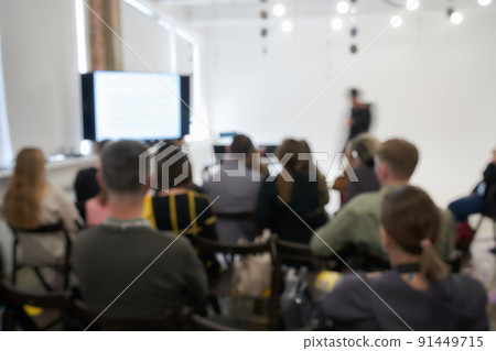 Blurred background of the business conference, one man on the stage, presentation of the project, public talk. High quality photo Blurred background of the business conference, one man on the stage, presentation of the project, public talk. High quality photo 91449715