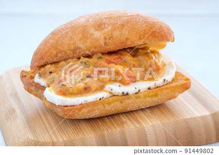Grilled eggplant mozzarella bruschetta 91449802