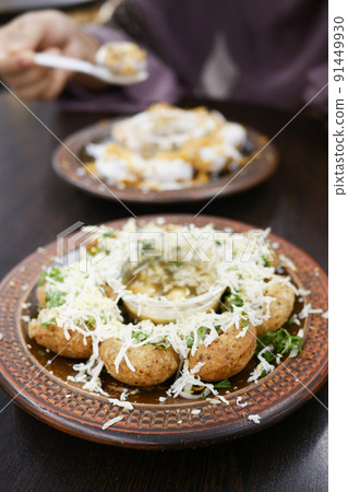 Fuska a delicious indian snackon table . Fuska a delicious indian snackon table . 91449930