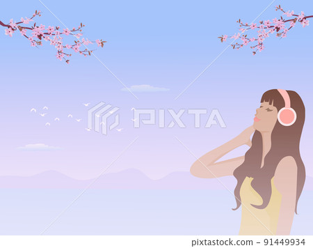 woman wearing headphones standing by the sea with cherry blossoms in the background woman wearing headphones standing by the sea with cherry blossoms in the background 91449934