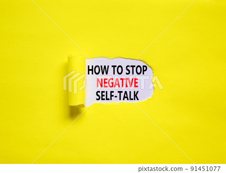 Stop negative self-talk symbol. Concept words How to stop negative self-talk on a beautiful yellow background. Psychological and stop negative self-talk concept. Copy space. Stop negative self-talk symbol. Concept words How to stop negative self-talk on a beautiful yellow background. Psychological and stop negative self-talk concept. Copy space. 91451077