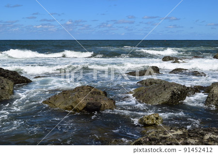 Rough waves in rocky areas of the Sea of Japan Rough waves in rocky areas of the Sea of Japan 91452412