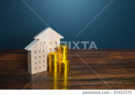 Houses and golden coins. Savings on household bills. Energy efficiency and energy saving. Profit from investment in housing. Municipal budget for the maintenance of buildings. Price cost estimate 91452575
