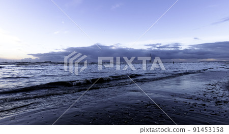 Sunset on Crosby Beach in winter, Crosby, UK Sunset on Crosby Beach in winter, Crosby, UK 91453158