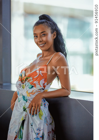 Young beautiful smiling asian woman posing in the supermarket 91456910