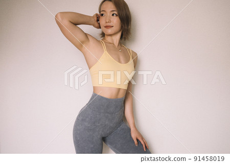 Female / sports instructor in fitness wear Female / sports instructor in fitness wear 91458019