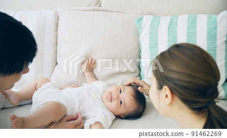 Family image of parents who care for their baby 91462269