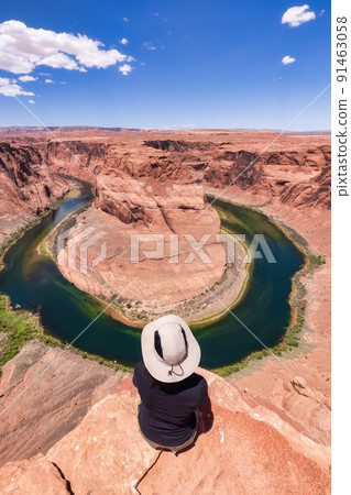Adventurous Caucasian Woman at Horseshoe Bend in Page, Arizona, United States. 91463058