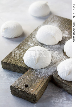 Delicate vanilla marshmallows on a vintage stone background. 91467451
