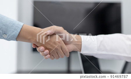 Employer or HR department welcomes new employees, Shaking hands with congratulations or achieving business and income success, selection of new staff representatives, Qualified, Hand shake concept. 91469787