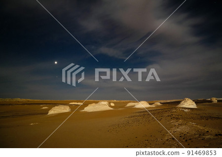 Night photography of the Abstract nature rock formations aka sculptures in White desert, Sahara, Egypt 91469853